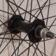 Rueda delantera R28 ARMADA clincher a bolillas 36H LIQUIDACION